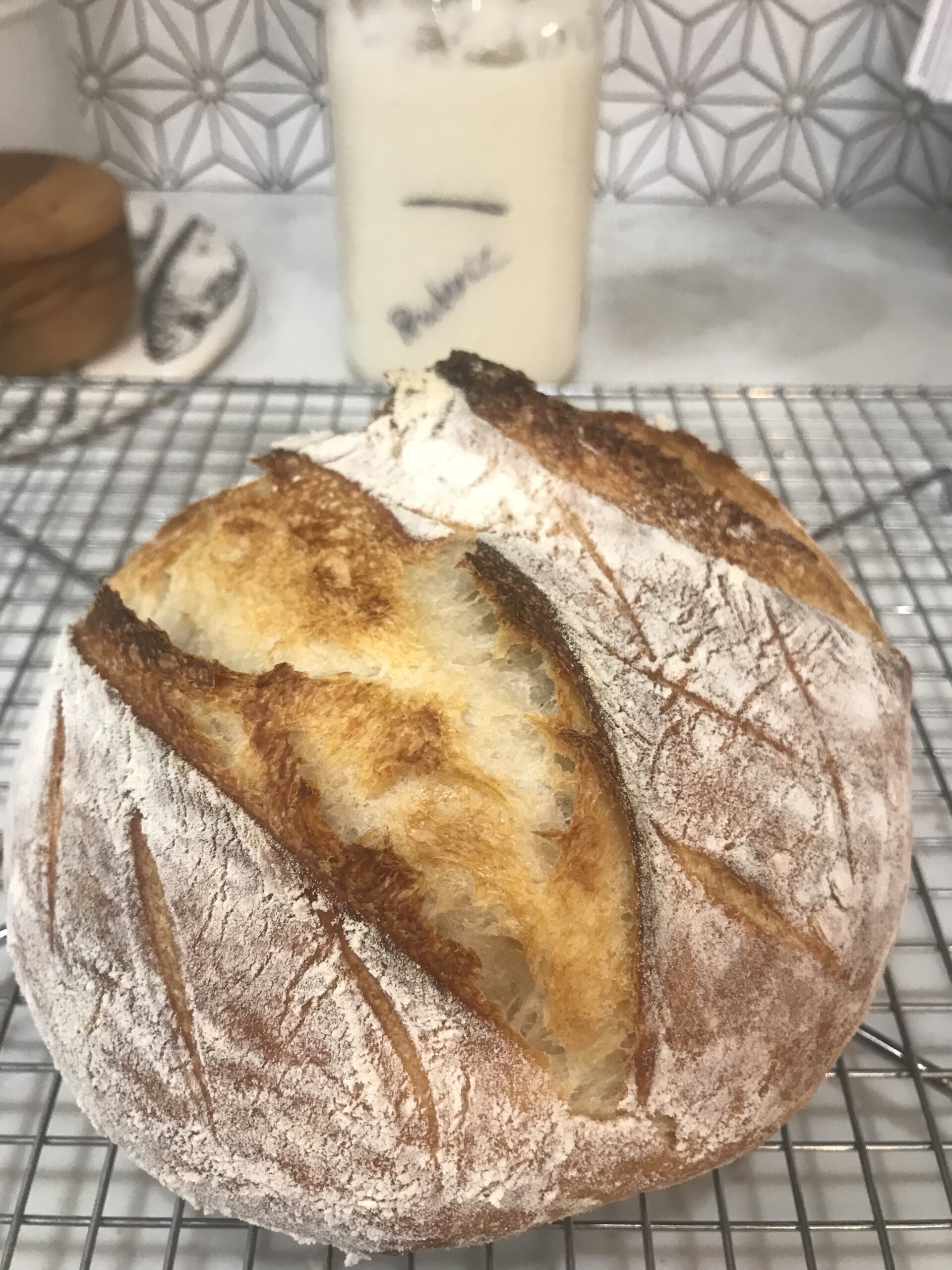 homemade sourdough bread on cooling rack