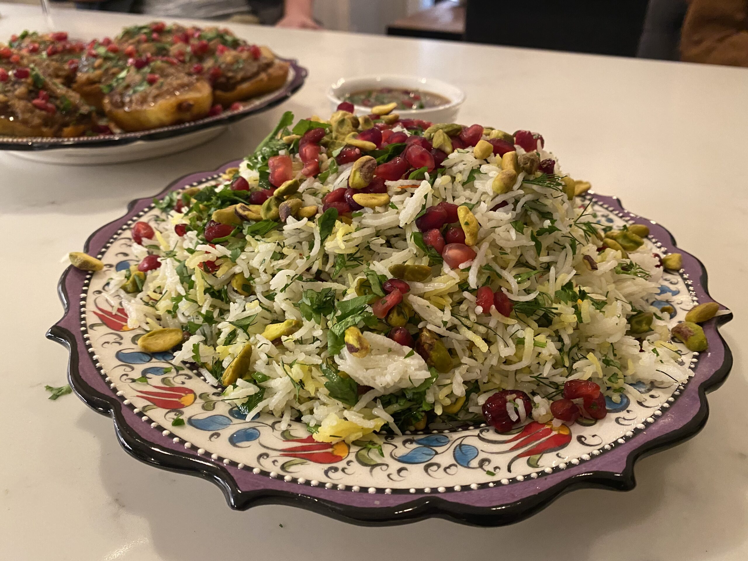 Saffron rice with cranberries, dill, parsley, tarragon and pistachio