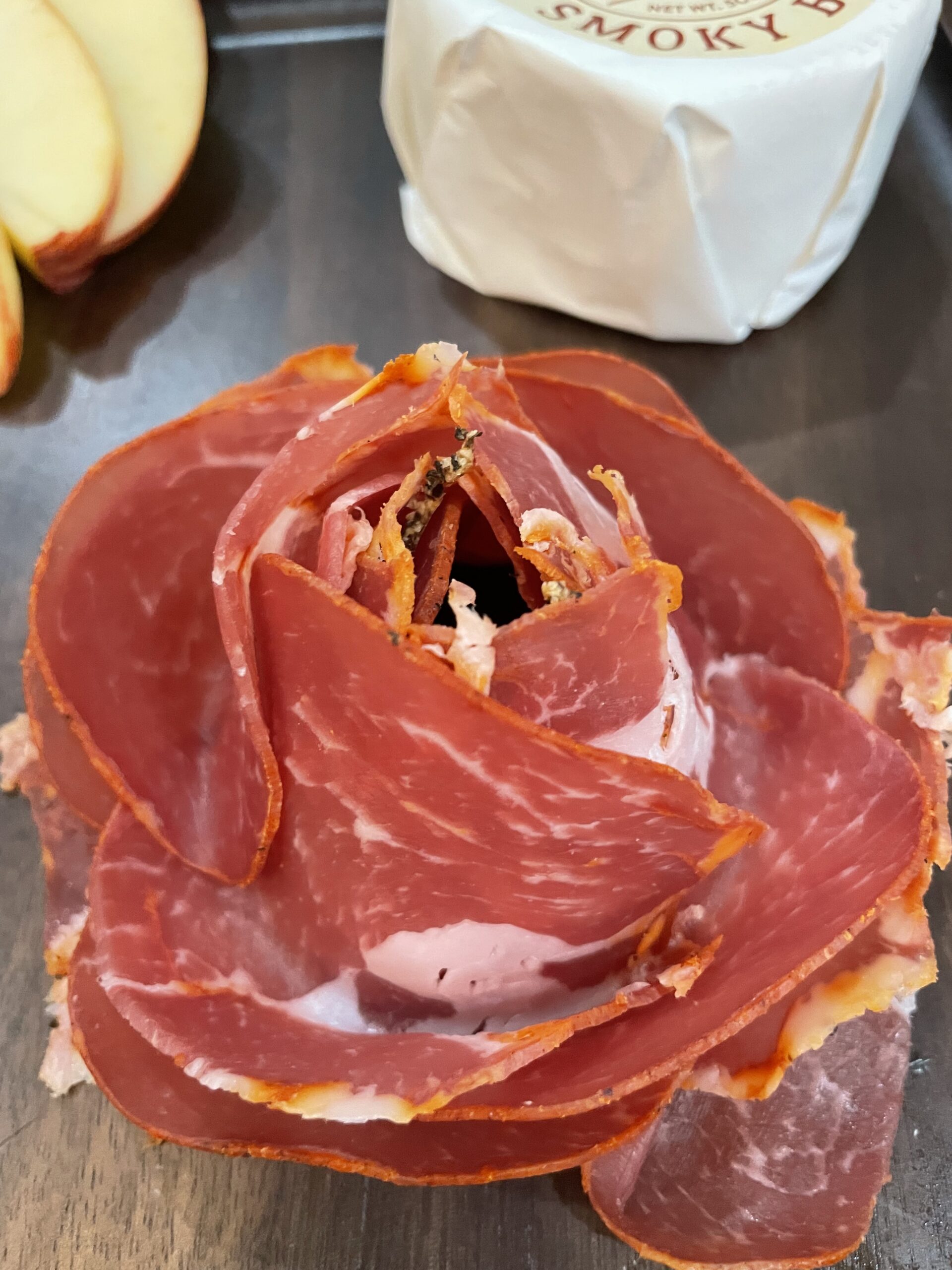 charcuterie meat in the shape of a flower rose