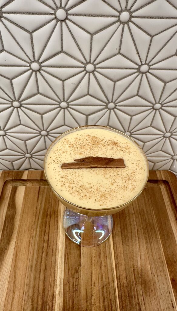 Eggnog cocktail in coupe glass